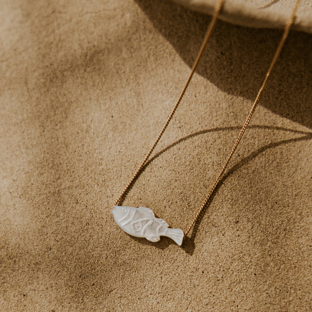 mother of pearl fish pendent on gold chain