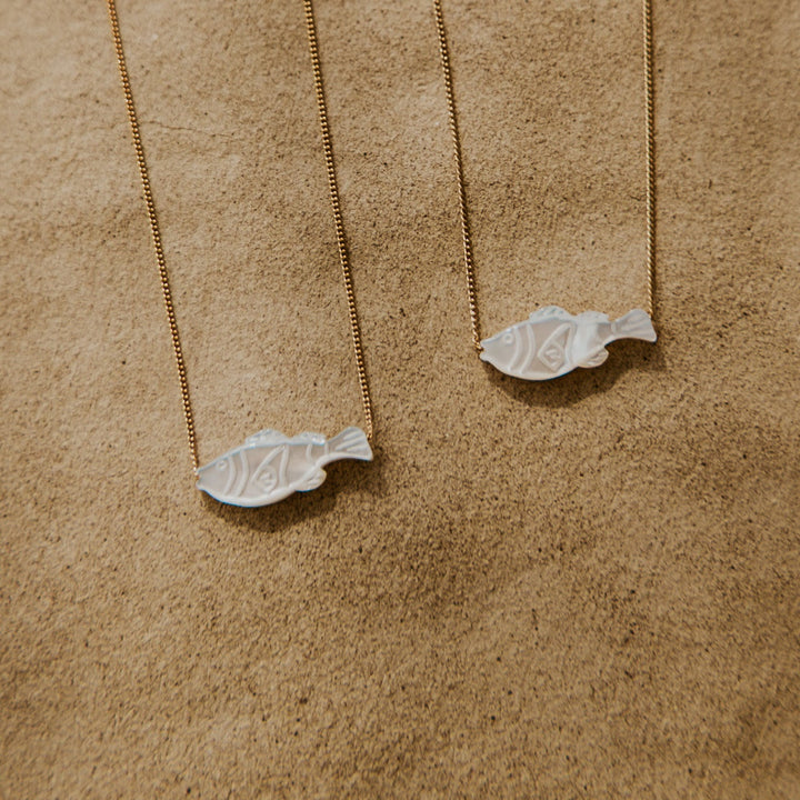 mother of peal fish pendents on thin 14k gold platted chain