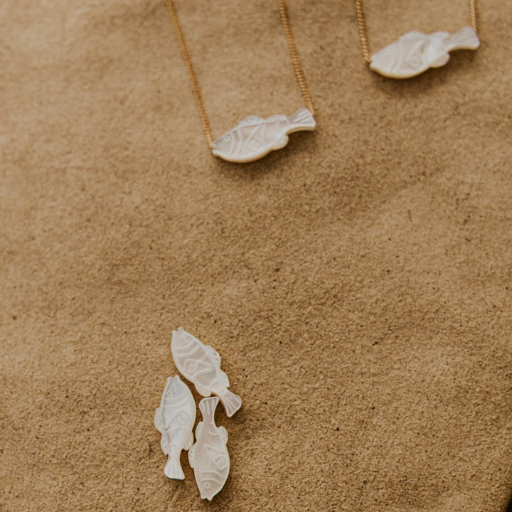 mother of pearl fish pendents on gold chain