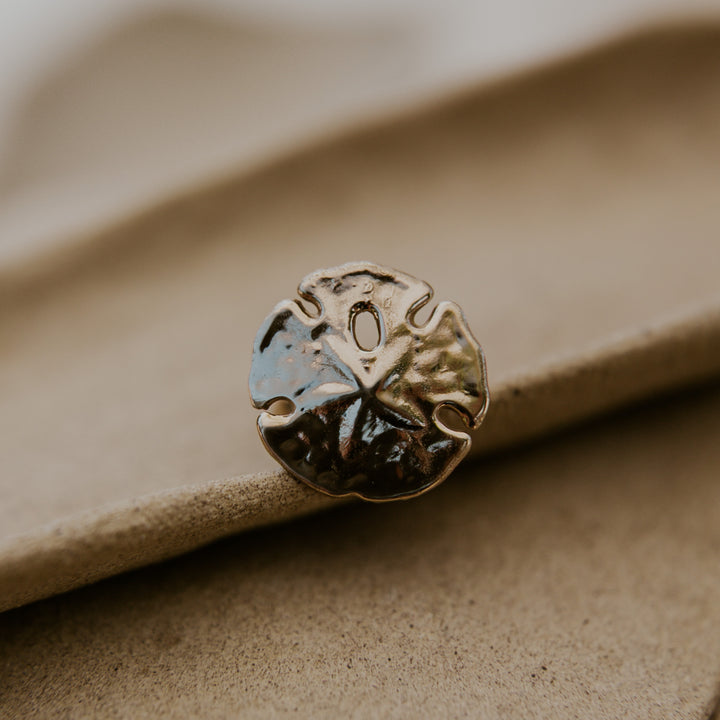 gold textured sand dollar cocktail ring