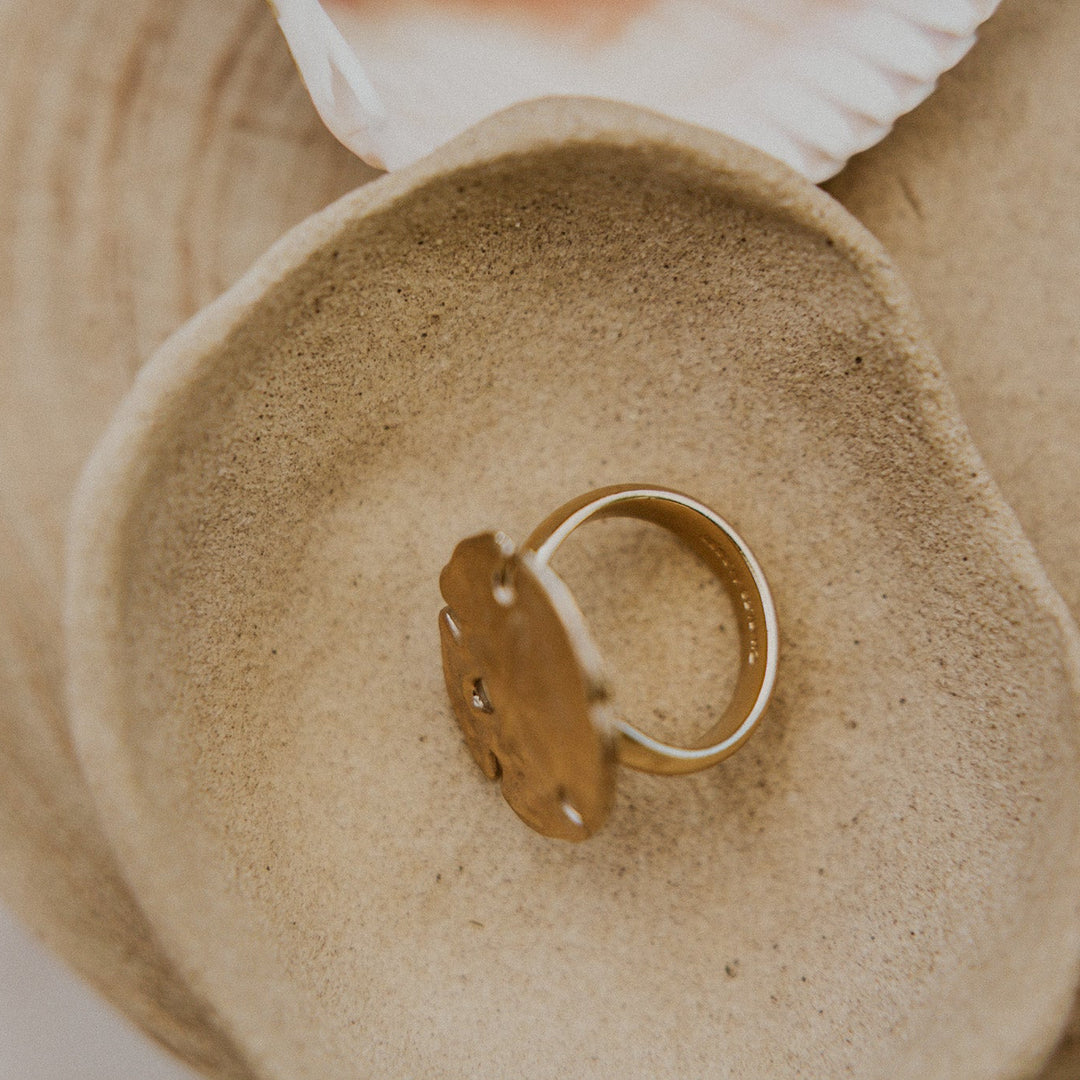 textured gold sand dollar cocktail ring
