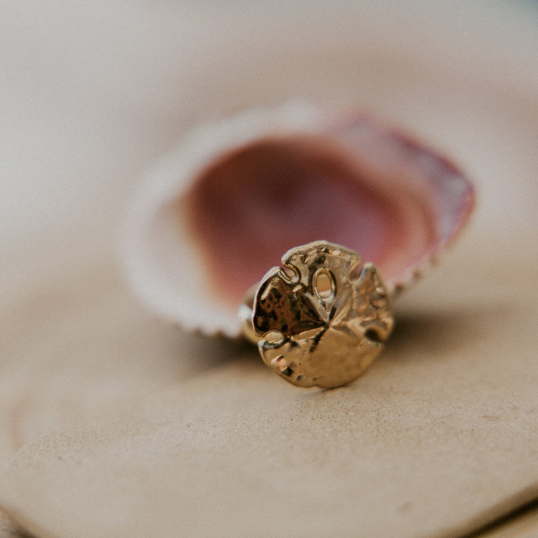 gold sand dollar cocktail ring