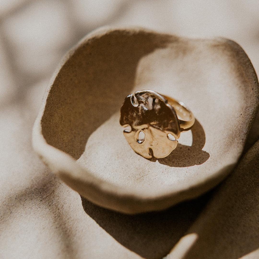 large gold sand dollar cocktail ring