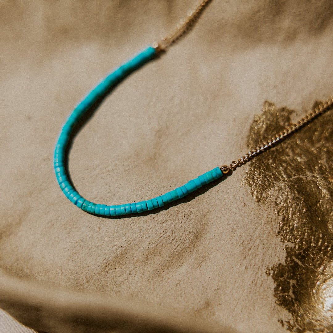 Turquoise beaded necklace on a 14k gold fill chain 