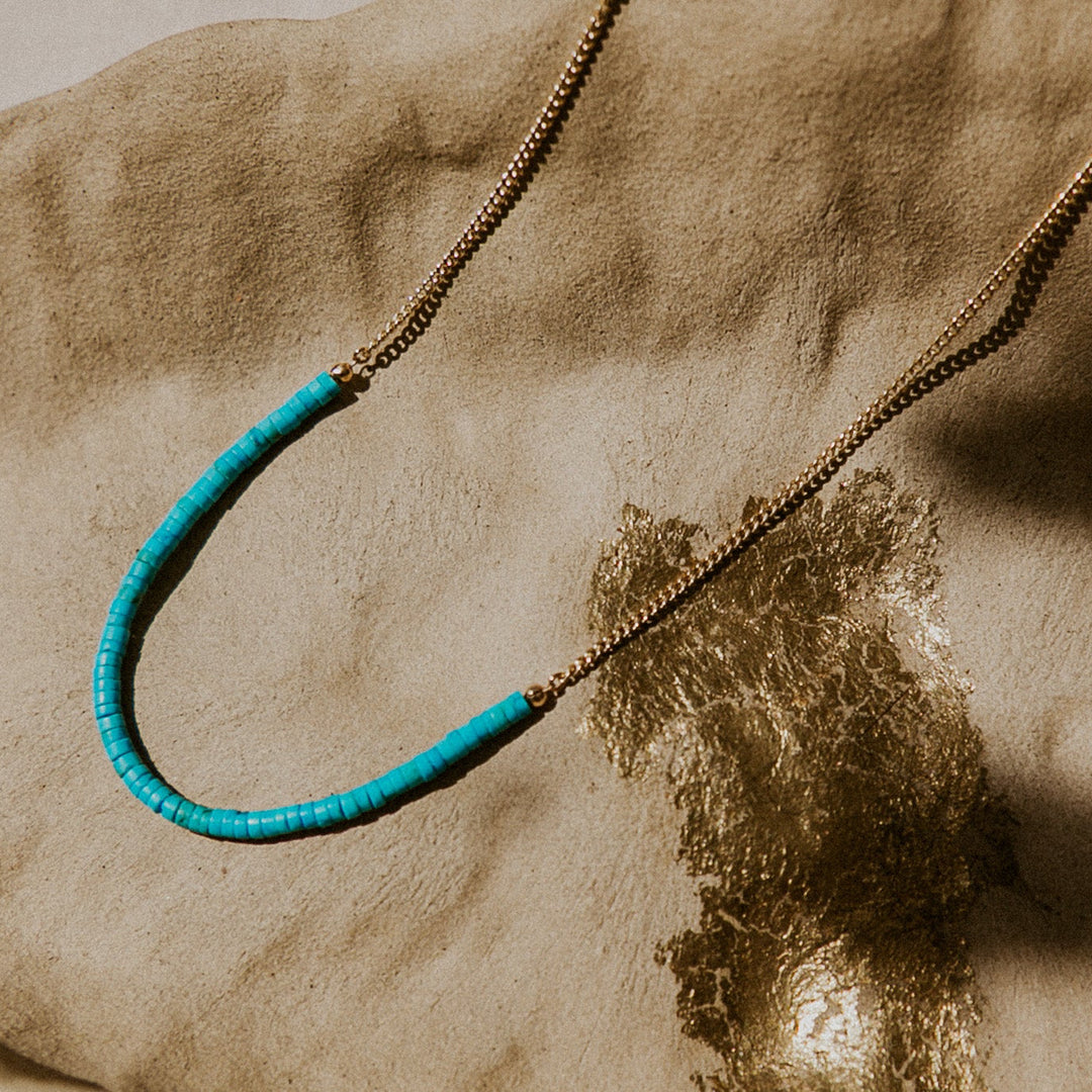 Turquoise beaded necklace on a 14k gold fill chain 