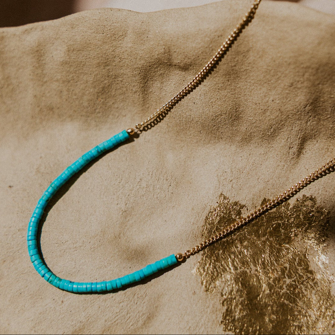 Turquoise beaded necklace on a 14k gold fill chain 