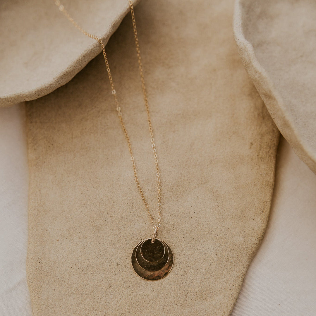 three 14k gold fill disc layered on a 14k gold fill delicate chain that can be personalized.