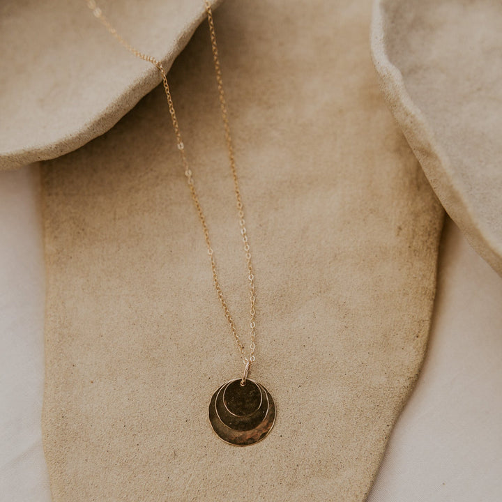 three 14k gold fill disc layered on a 14k gold fill delicate chain that can be personalized.
