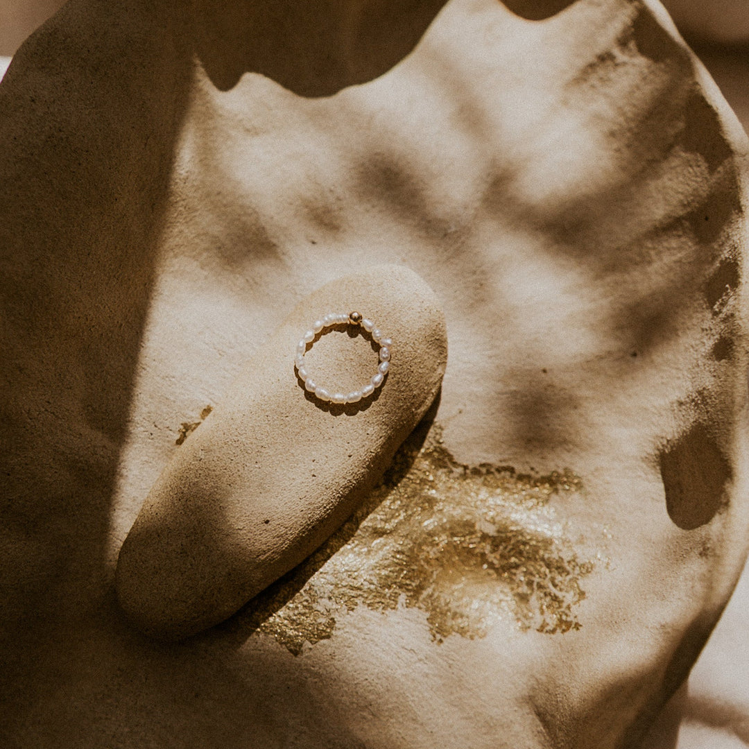 pearl ring with gold bead