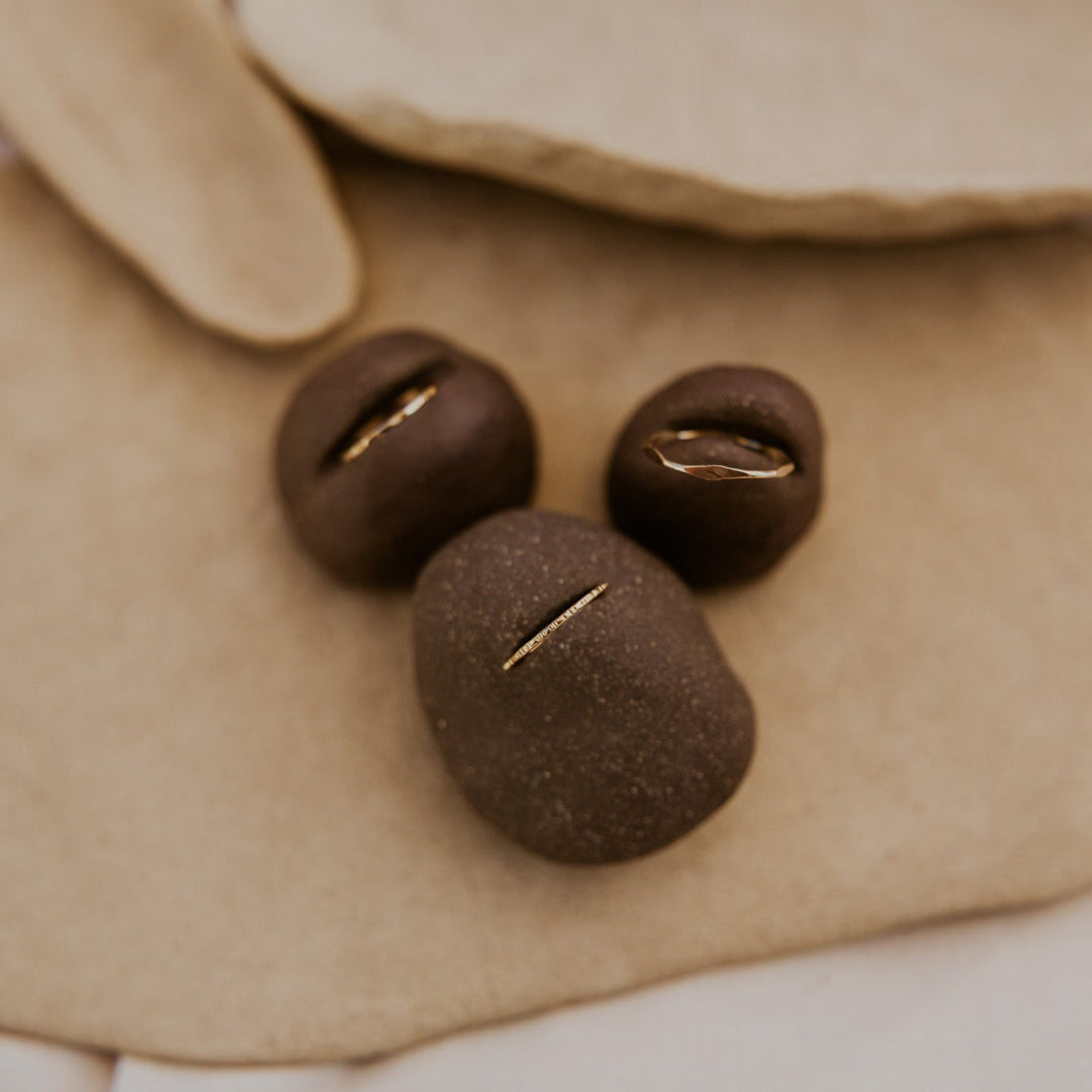 3 14k gold fill rings with different hammered textures stacked 