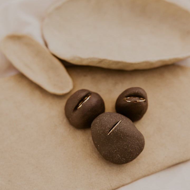 3 14k gold fill rings with different hammered textures stacked 