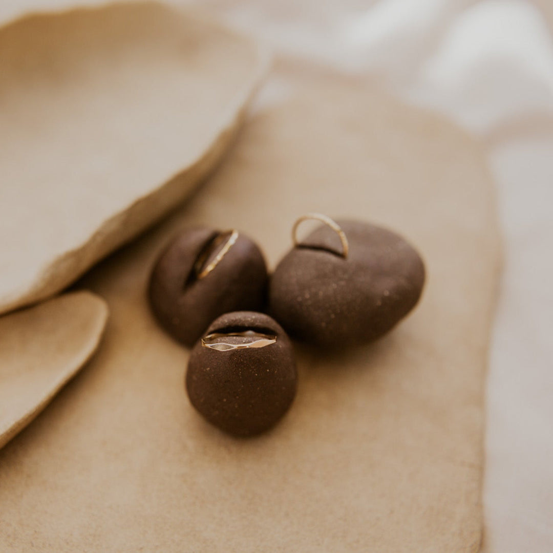 3 14k gold fill rings with different hammered textures stacked 