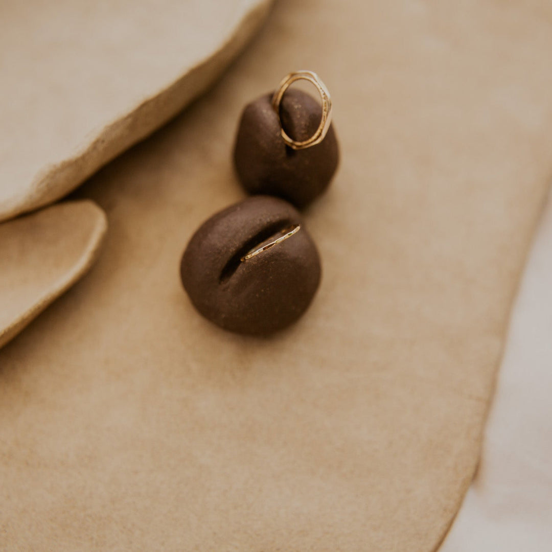 3 14k gold fill rings with different hammered textures stacked 