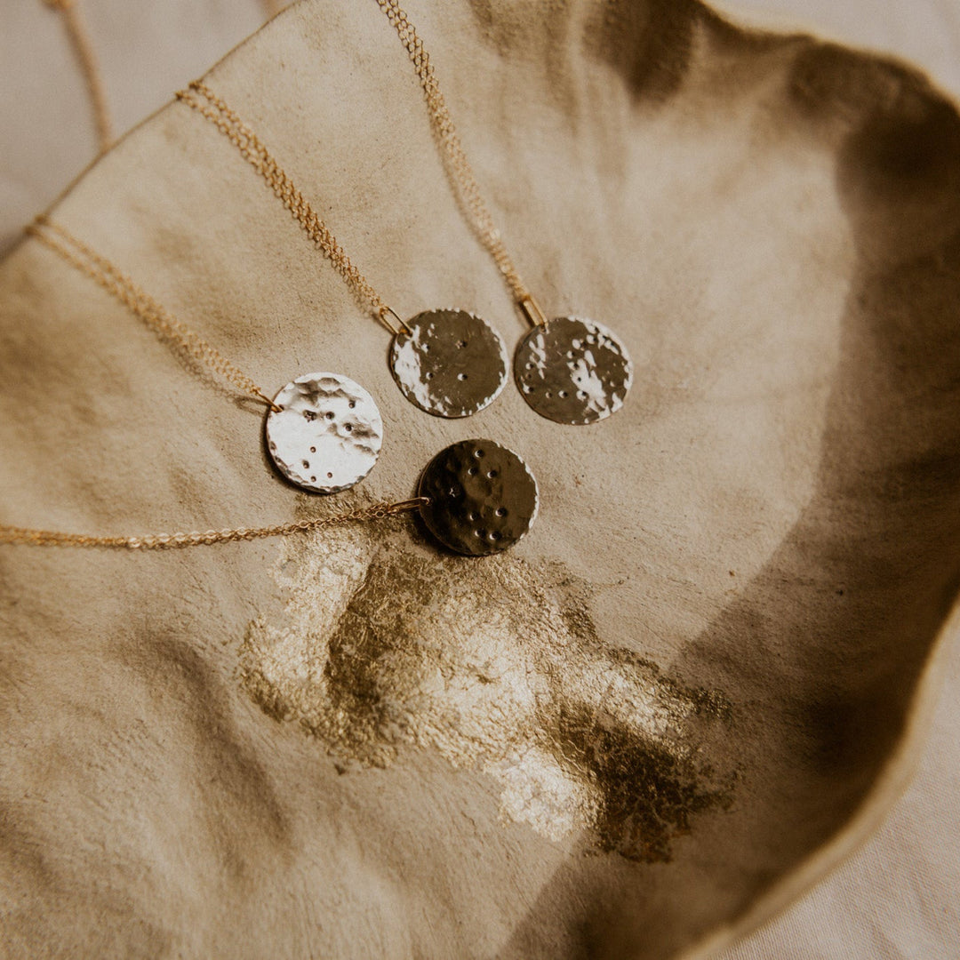 Gold necklace with a 14k gold fill rectangle pendant and small diamond on gold chain 