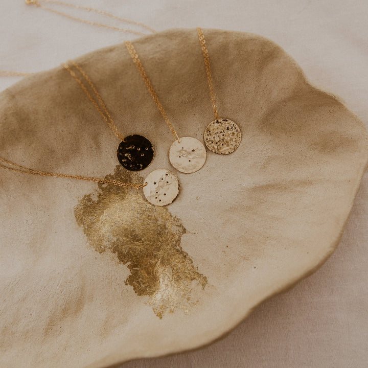 Gold necklace with a 14k gold fill rectangle pendant and small diamond on gold chain 