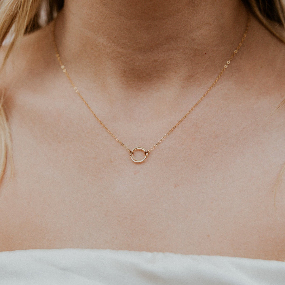 14k Gold fill necklace with two interlocking gold circles on gold chain