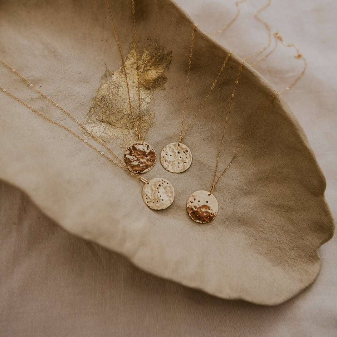 Gold necklace with a 14k gold fill rectangle pendant and small diamond on gold chain 