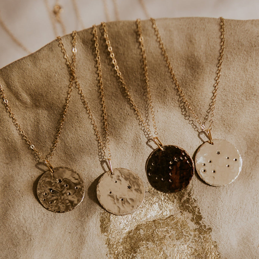 Gold necklace with a 14k gold fill rectangle pendant and small diamond on gold chain 