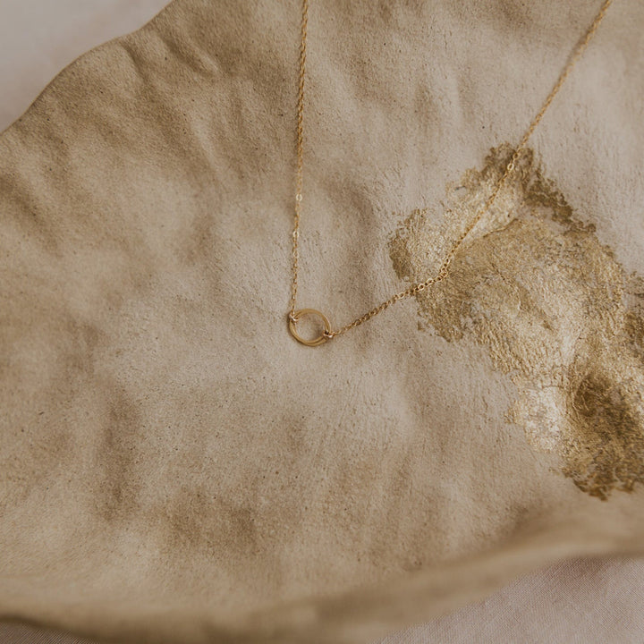 14k Gold fill necklace with two interlocking gold circles on gold chain