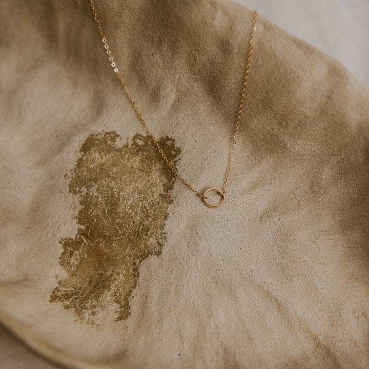 14k Gold fill necklace with two interlocking gold circles on gold chain