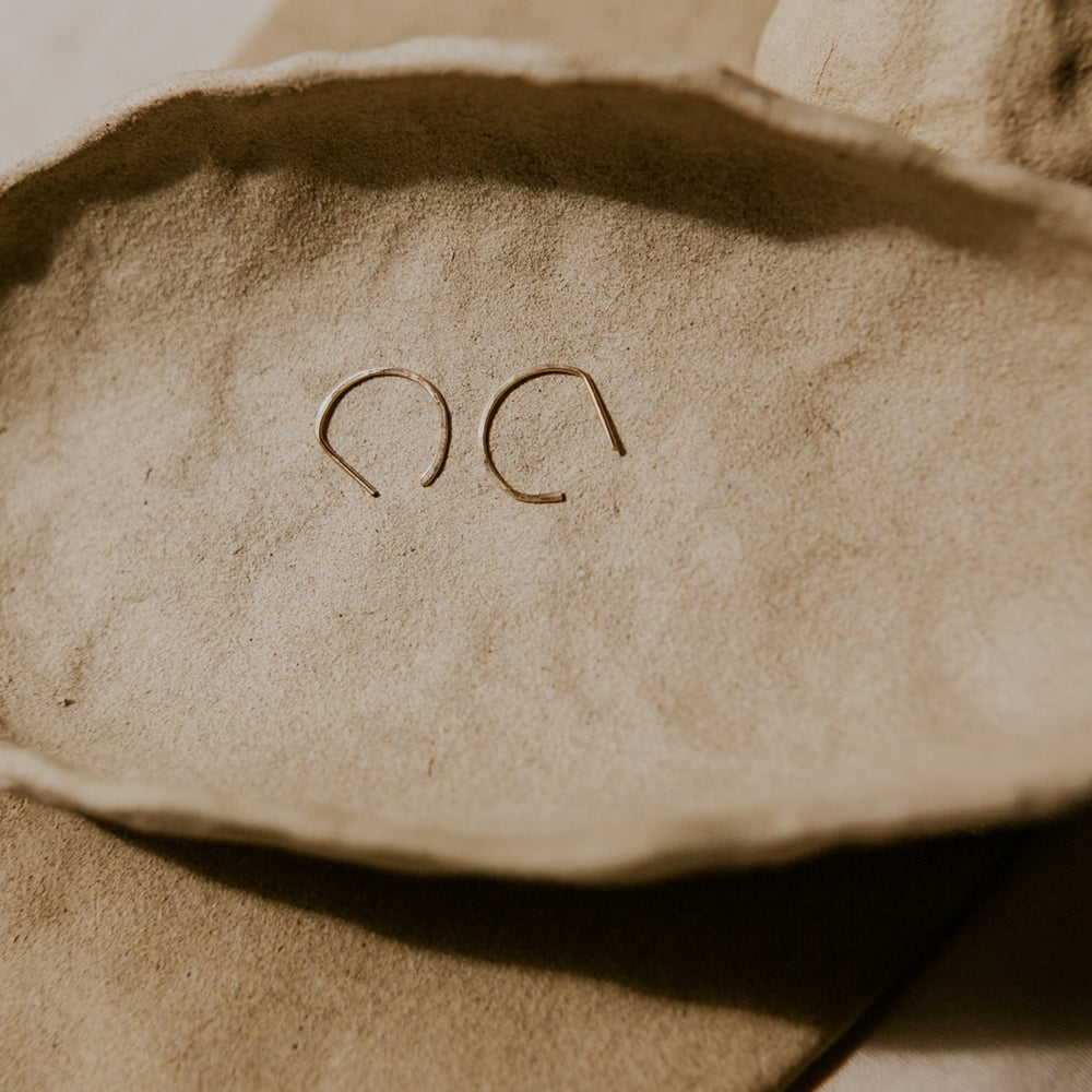 Close-up of a textured surface with 'POC' embossed on it.