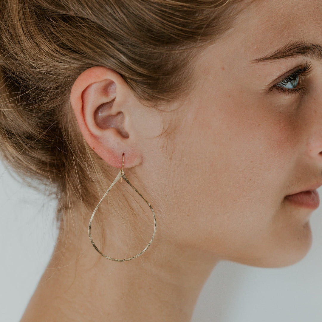 teardrop 14k gold fill earrings on model