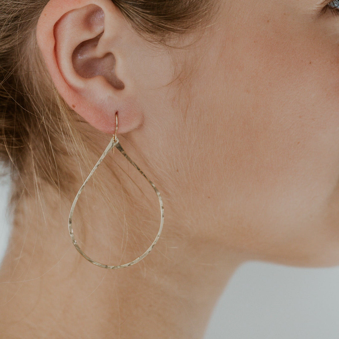 teardrop 14k gold fill earrings on model