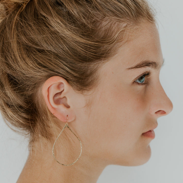 teardrop 14k gold fill earrings on model