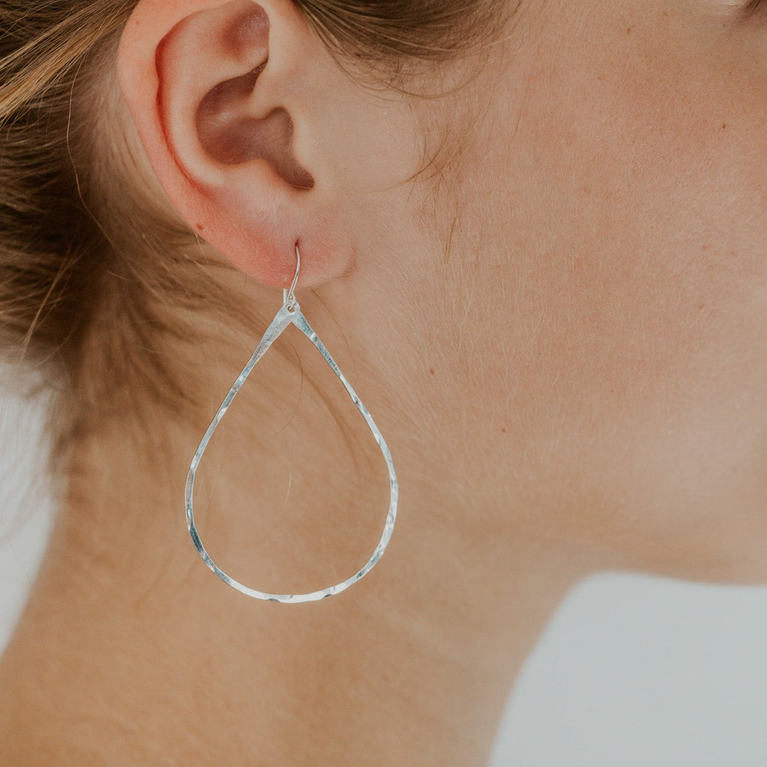 teardrop 14k gold fill earrings on model