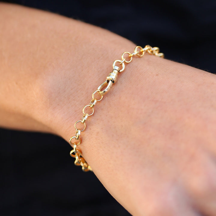 Close-up of the Amelia bracelet on the wrist, gold filled round links and swivel clasp