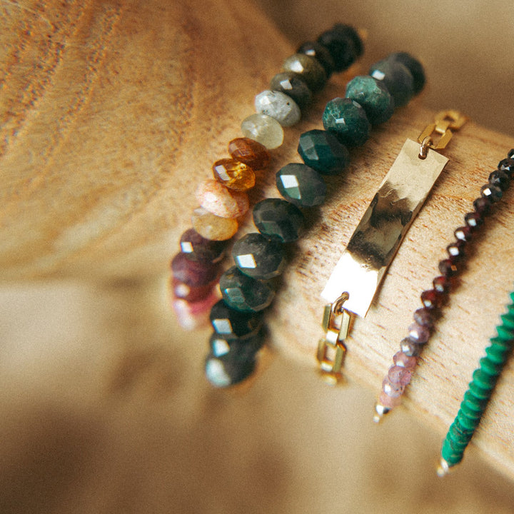 Diane Bracelet gemstone jewelry featuring a mix of colorful gemstones and gold accents for stylish layering