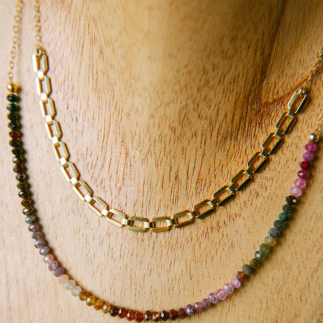 Farrah gold necklace featuring a delicate link design perfect for layering with other jewelry