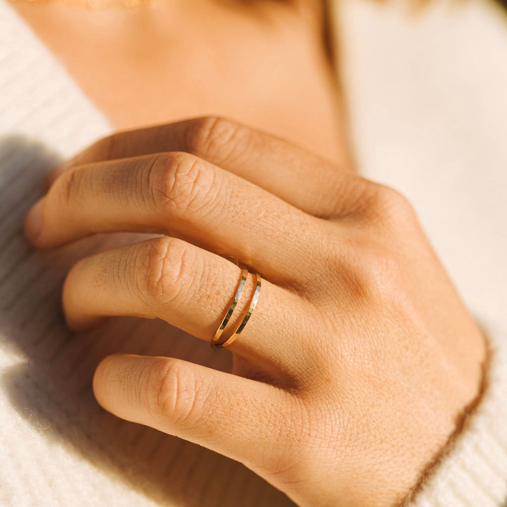 Teressa Lane Jewelry handmade stacking ring worn on finger with gold finish on hand