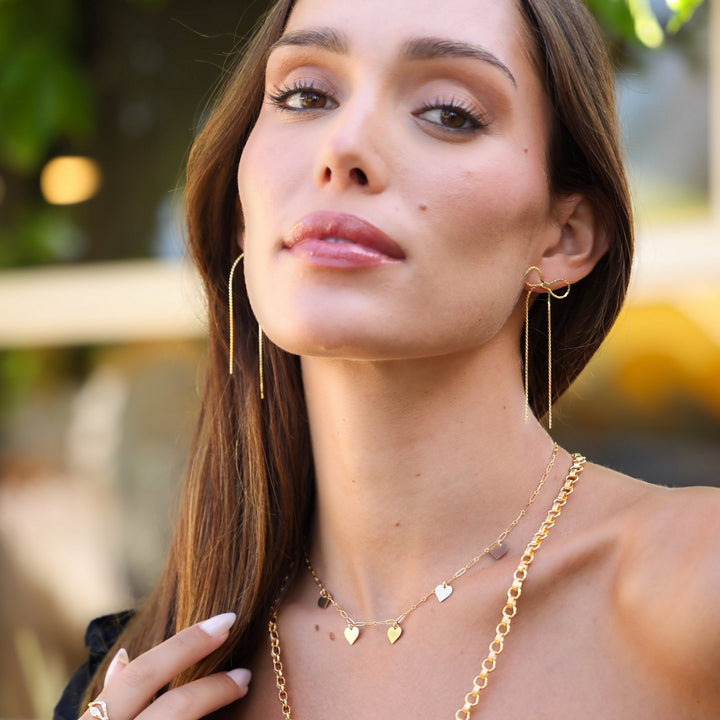 Gold filled Heart dangle necklace worn high on the neck with the Vivienne chain layered below