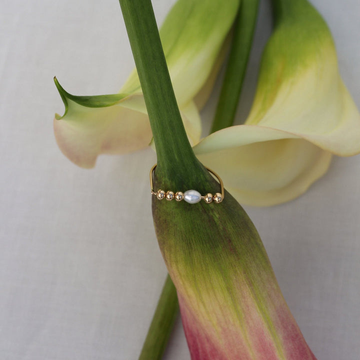 Beaded Pearl Remi ring on a calla lily stem, a freshwater pearl set between 14k gold filled beads