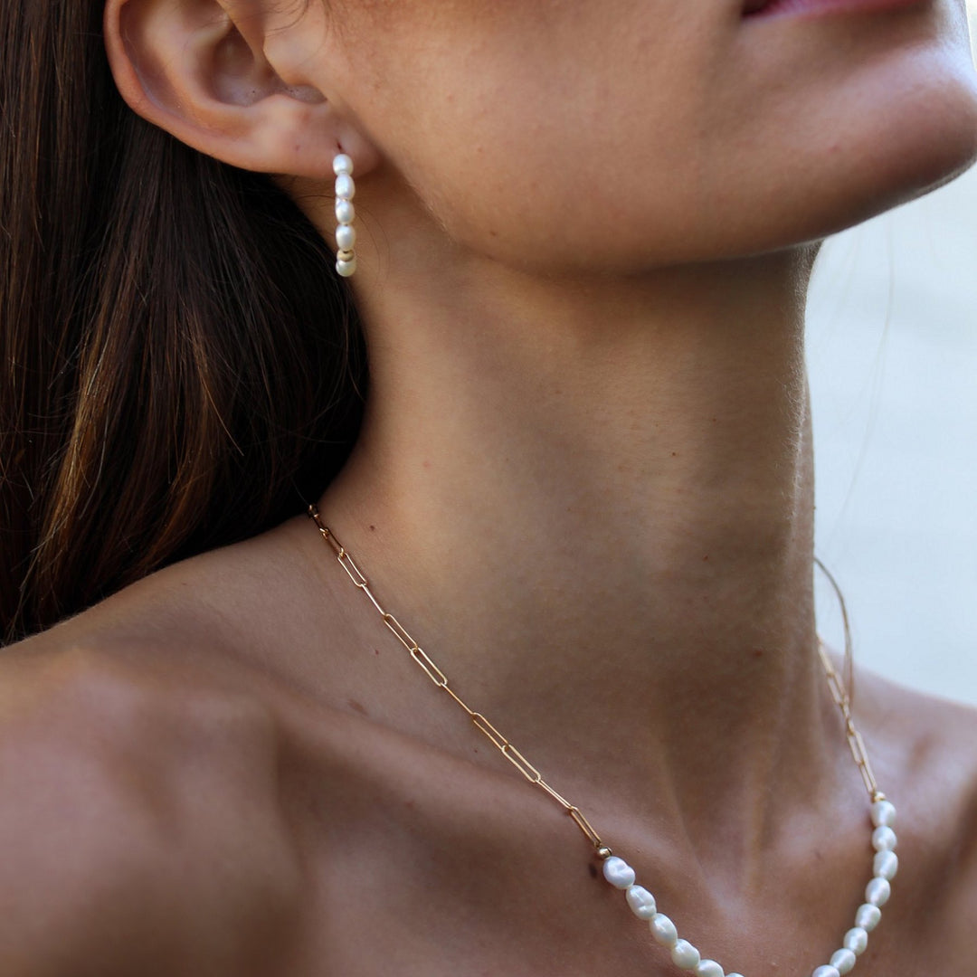Pearl Solace hoop styled with the Colette pearl and paperclip chain necklace