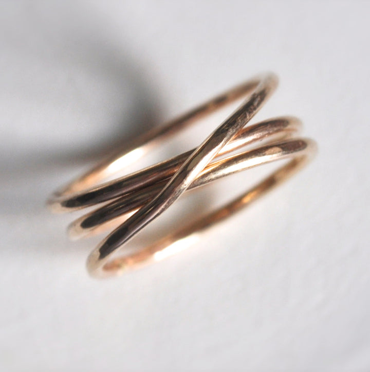 Teressa Lane Jewelry handmade stacking ring featuring delicate intertwined thin gold bands