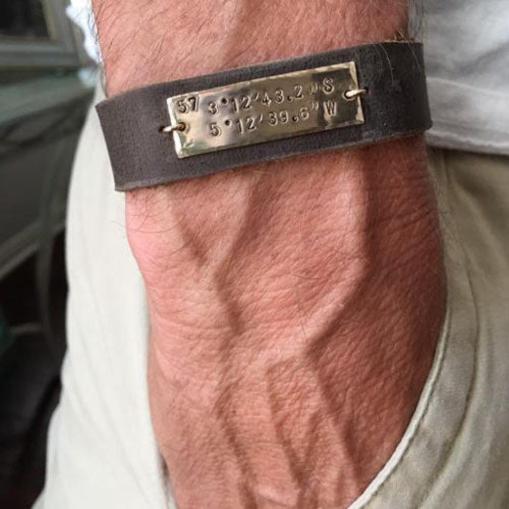 Teressa Lane Jewelry men's leather cuff bracelet with engraved metal plate worn on wrist