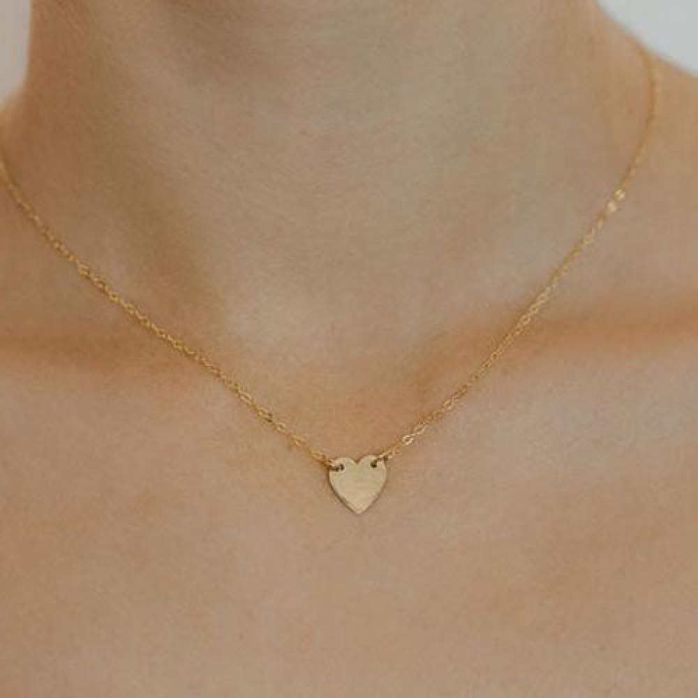 Teressa Lane Jewelry delicate gold heart necklace with small heart pendant on a fine chain
